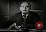 Image of Bolshevik leader Vladimir Lenin talking with secretary Moscow Russia Soviet Union, 1917, second 10 stock footage video 65675056592