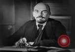 Image of Bolshevik leader Vladimir Lenin talking with secretary Moscow Russia Soviet Union, 1917, second 13 stock footage video 65675056592