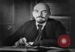 Image of Bolshevik leader Vladimir Lenin talking with secretary Moscow Russia Soviet Union, 1917, second 14 stock footage video 65675056592