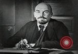 Image of Bolshevik leader Vladimir Lenin talking with secretary Moscow Russia Soviet Union, 1917, second 15 stock footage video 65675056592