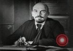 Image of Bolshevik leader Vladimir Lenin talking with secretary Moscow Russia Soviet Union, 1917, second 18 stock footage video 65675056592