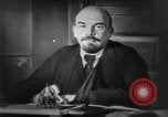 Image of Bolshevik leader Vladimir Lenin talking with secretary Moscow Russia Soviet Union, 1917, second 19 stock footage video 65675056592