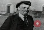 Image of Bolshevik leader Vladimir Lenin talking with secretary Moscow Russia Soviet Union, 1917, second 45 stock footage video 65675056592