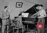 Image of David Fyodorovich Oistrakh  playing violin Moscow Russia Soviet Union, 1946, second 9 stock footage video 65675056632