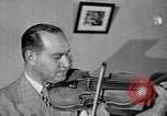 Image of David Fyodorovich Oistrakh  playing violin Moscow Russia Soviet Union, 1946, second 10 stock footage video 65675056632