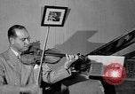 Image of David Fyodorovich Oistrakh  playing violin Moscow Russia Soviet Union, 1946, second 16 stock footage video 65675056632