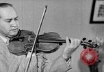 Image of David Fyodorovich Oistrakh  playing violin Moscow Russia Soviet Union, 1946, second 35 stock footage video 65675056632