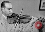 Image of David Fyodorovich Oistrakh  playing violin Moscow Russia Soviet Union, 1946, second 37 stock footage video 65675056632