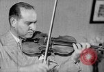 Image of David Fyodorovich Oistrakh  playing violin Moscow Russia Soviet Union, 1946, second 38 stock footage video 65675056632