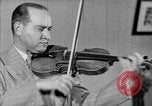 Image of David Fyodorovich Oistrakh  playing violin Moscow Russia Soviet Union, 1946, second 39 stock footage video 65675056632