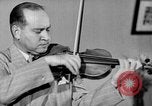 Image of David Fyodorovich Oistrakh  playing violin Moscow Russia Soviet Union, 1946, second 47 stock footage video 65675056632