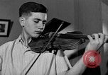 Image of David Fyodorovich Oistrakh  playing violin Moscow Russia Soviet Union, 1946, second 51 stock footage video 65675056632