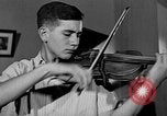 Image of David Fyodorovich Oistrakh  playing violin Moscow Russia Soviet Union, 1946, second 52 stock footage video 65675056632