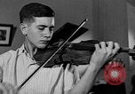 Image of David Fyodorovich Oistrakh  playing violin Moscow Russia Soviet Union, 1946, second 53 stock footage video 65675056632