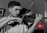Image of David Fyodorovich Oistrakh  playing violin Moscow Russia Soviet Union, 1946, second 54 stock footage video 65675056632