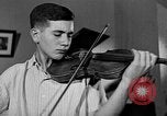 Image of David Fyodorovich Oistrakh  playing violin Moscow Russia Soviet Union, 1946, second 55 stock footage video 65675056632