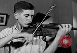 Image of David Fyodorovich Oistrakh  playing violin Moscow Russia Soviet Union, 1946, second 56 stock footage video 65675056632