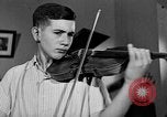 Image of David Fyodorovich Oistrakh  playing violin Moscow Russia Soviet Union, 1946, second 57 stock footage video 65675056632
