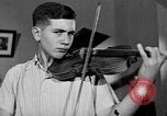 Image of David Fyodorovich Oistrakh  playing violin Moscow Russia Soviet Union, 1946, second 58 stock footage video 65675056632