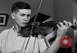 Image of David Fyodorovich Oistrakh  playing violin Moscow Russia Soviet Union, 1946, second 59 stock footage video 65675056632