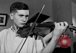 Image of David Fyodorovich Oistrakh  playing violin Moscow Russia Soviet Union, 1946, second 60 stock footage video 65675056632
