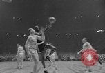 Image of National Invitational basketball championship match New York City USA, 1953, second 62 stock footage video 65675056671