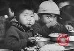 Immagine di Inizio guerra coreana scene La Germania est, 1953, secondo 23 filmato di repertorio 65675056708