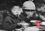 Immagine di Inizio guerra coreana scene La Germania est, 1953, secondo 24 filmato di repertorio 65675056708
