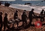 Image of Wounded marines carried to Higgins boats Iwo Jima, 1945, second 3 stock footage video 65675056725