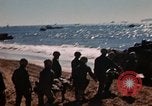 Image of Wounded marines carried to Higgins boats Iwo Jima, 1945, second 5 stock footage video 65675056725