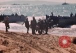 Image of Wounded marines carried to Higgins boats Iwo Jima, 1945, second 6 stock footage video 65675056725