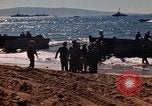 Image of Wounded marines carried to Higgins boats Iwo Jima, 1945, second 7 stock footage video 65675056725