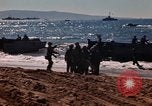 Image of Wounded marines carried to Higgins boats Iwo Jima, 1945, second 8 stock footage video 65675056725