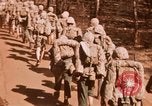Image of Wounded marines carried to Higgins boats Iwo Jima, 1945, second 9 stock footage video 65675056725