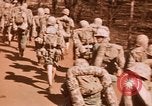 Image of Wounded marines carried to Higgins boats Iwo Jima, 1945, second 11 stock footage video 65675056725