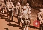 Image of Wounded marines carried to Higgins boats Iwo Jima, 1945, second 13 stock footage video 65675056725