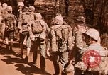 Image of Wounded marines carried to Higgins boats Iwo Jima, 1945, second 14 stock footage video 65675056725