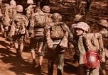 Image of Wounded marines carried to Higgins boats Iwo Jima, 1945, second 15 stock footage video 65675056725