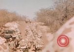 Image of Wounded marines carried to Higgins boats Iwo Jima, 1945, second 16 stock footage video 65675056725