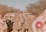 Image of Wounded marines carried to Higgins boats Iwo Jima, 1945, second 20 stock footage video 65675056725