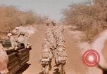 Image of Wounded marines carried to Higgins boats Iwo Jima, 1945, second 21 stock footage video 65675056725