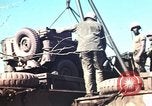Image of Wounded marines carried to Higgins boats Iwo Jima, 1945, second 31 stock footage video 65675056725