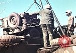 Image of Wounded marines carried to Higgins boats Iwo Jima, 1945, second 32 stock footage video 65675056725
