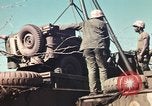 Image of Wounded marines carried to Higgins boats Iwo Jima, 1945, second 33 stock footage video 65675056725