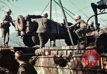 Image of Wounded marines carried to Higgins boats Iwo Jima, 1945, second 36 stock footage video 65675056725
