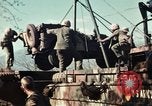 Image of Wounded marines carried to Higgins boats Iwo Jima, 1945, second 38 stock footage video 65675056725