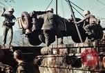 Image of Wounded marines carried to Higgins boats Iwo Jima, 1945, second 43 stock footage video 65675056725