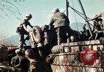 Image of Wounded marines carried to Higgins boats Iwo Jima, 1945, second 47 stock footage video 65675056725