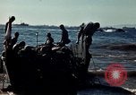 Image of Wounded marines carried to Higgins boats Iwo Jima, 1945, second 49 stock footage video 65675056725