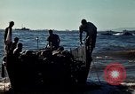 Image of Wounded marines carried to Higgins boats Iwo Jima, 1945, second 51 stock footage video 65675056725
